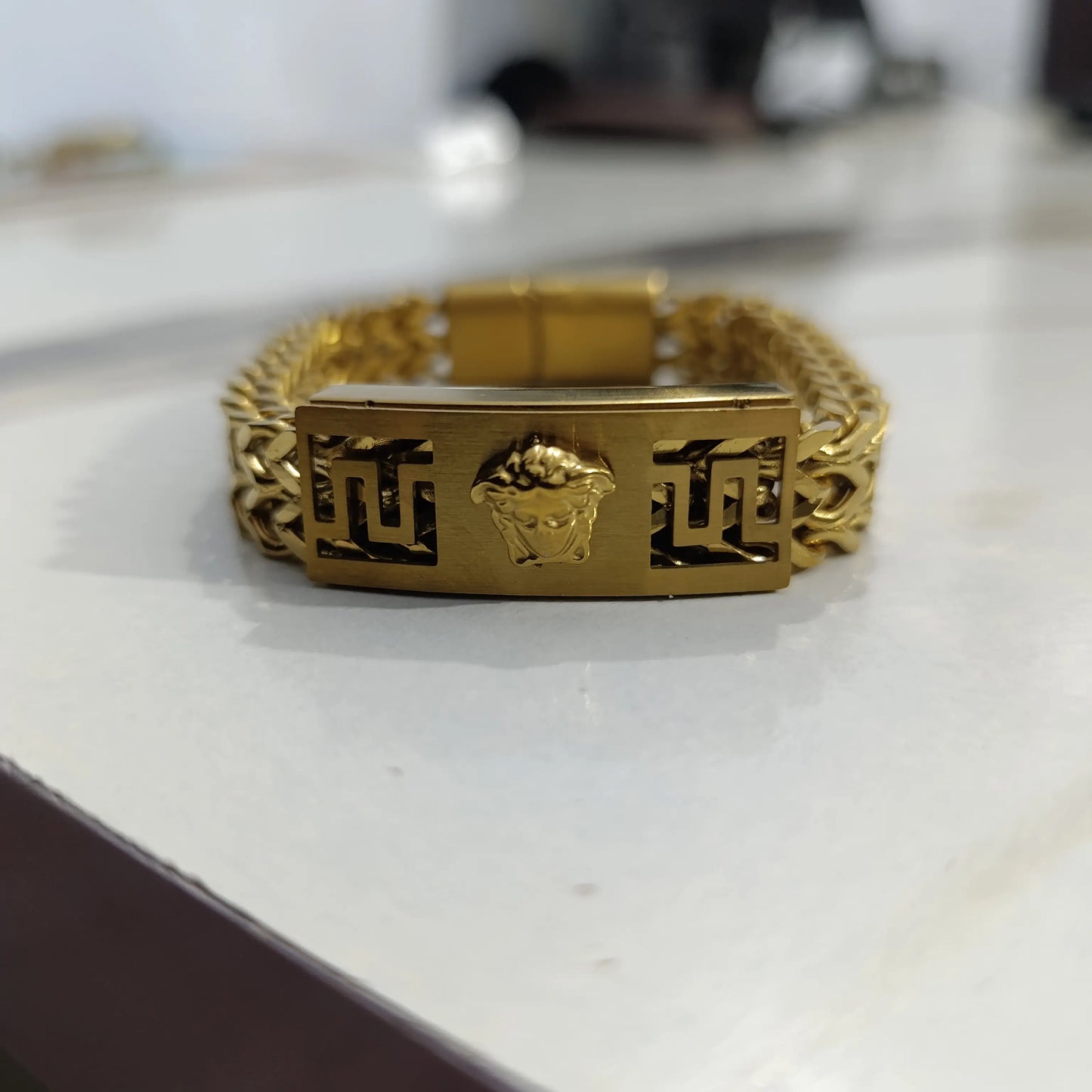 Premium Gold Braided Chain Bracelet with Signature Motif